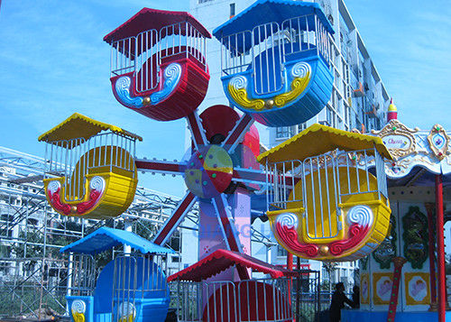 Mini Ferris Wheel Kiddie Ride, Modern Ferris Wheel Kapasitas 10/12 Orang pemasok